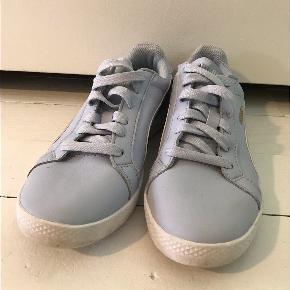 Pale blue puma sneakers